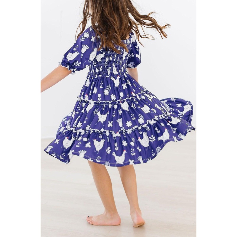 Feathered Friends Smocked Ruffle Dress