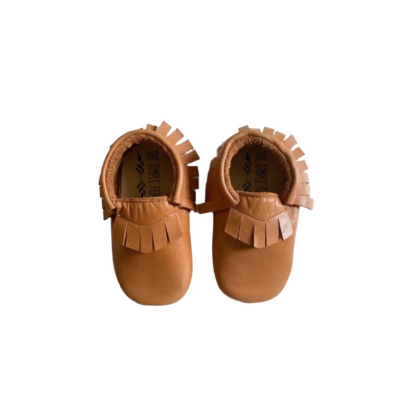 The Soft Sole Moccasin – Tan|US 1.5 / EU 17 / UK 1|US 2.5 / EU 18 / UK 2|US 3.5 / EU 19 / UK 3|US 4.5 / EU 20 / UK 4|US 5.5 / EU 21 / UK 5|US 6.5 / EU 22 / UK 6|US 7 / EU 23 / UK 7|US 8 / EU 24 / UK 7.5